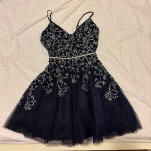 Blue dress, with blue glitter designs.